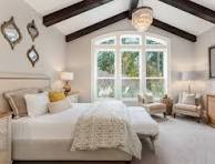 Modern bedroom interior design with large window, wooden ceiling beams and elegant furniture – Bedroom Interior Design in Gorakhpur
