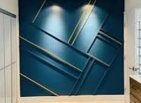 Modern geometric wall texture design in Gorakhpur with blue panels and golden lines by Gorakhpur Interior World